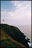 Lighthouse on the end (Byron bay).jpg